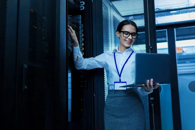 Amazing Day Happy Beautiful Woman Working Server Cabinet Holding Her Laptop - Aruba Certified Switching Professional study guide
