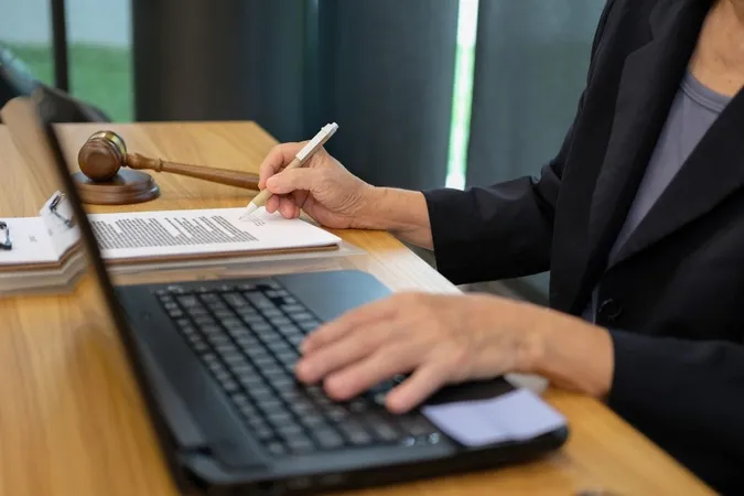 Man Using Laptop Table X - California Certified Paralegal study guide