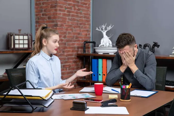 Top View Pencil Pushers Discussng One Important Issue Office X - Certified Specialist in Anger Management study guide