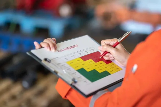 Manager Is Using Ballpoint Pen Marking Risk Assessment Matrix High Risk Level X - Safety Assessment Federation Certification study guide